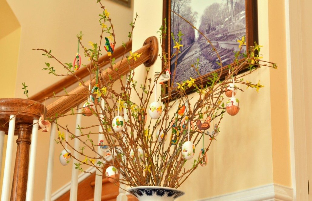 decorated eggs hang on pussy willow for German Easter Celebration