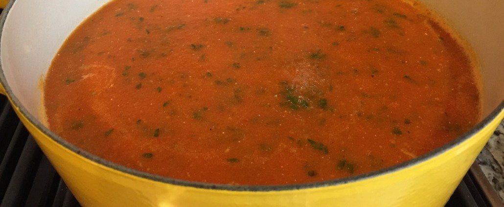 Serving the homemade tomato soup