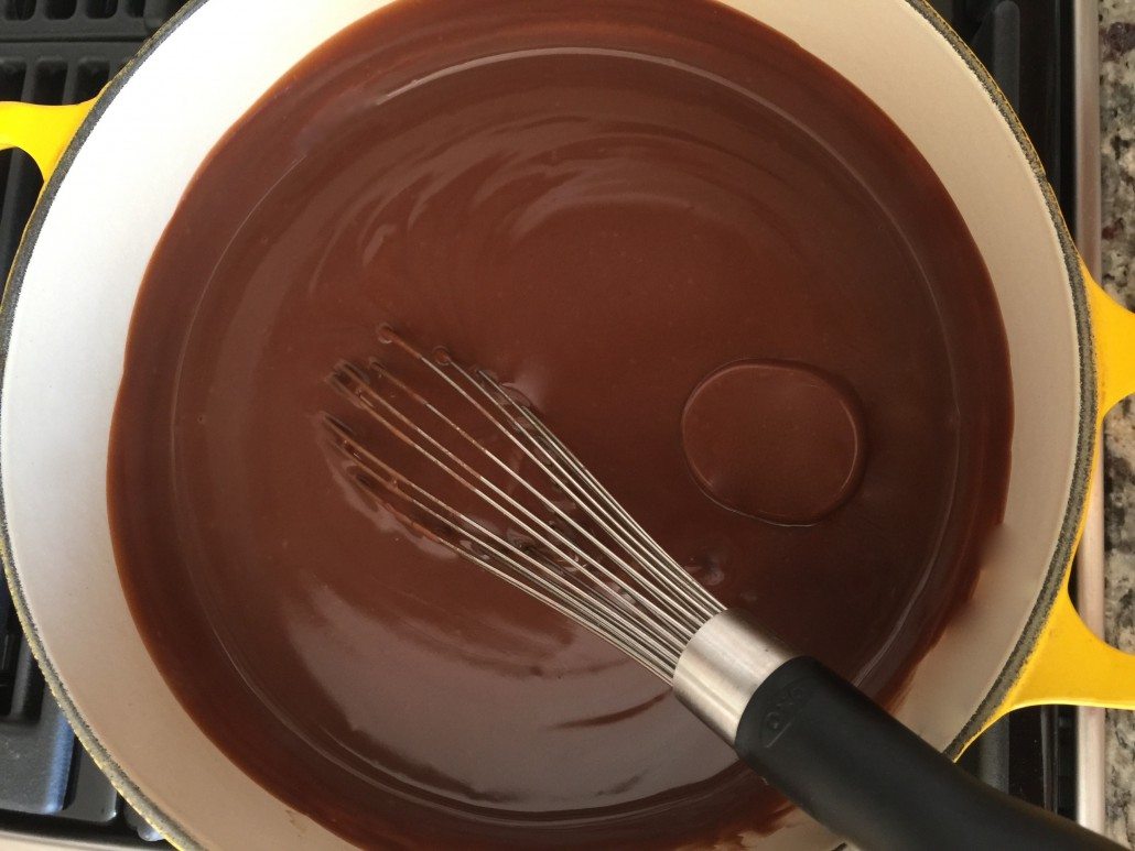 cooking the pudding for the German mocha buttercream cake recipe